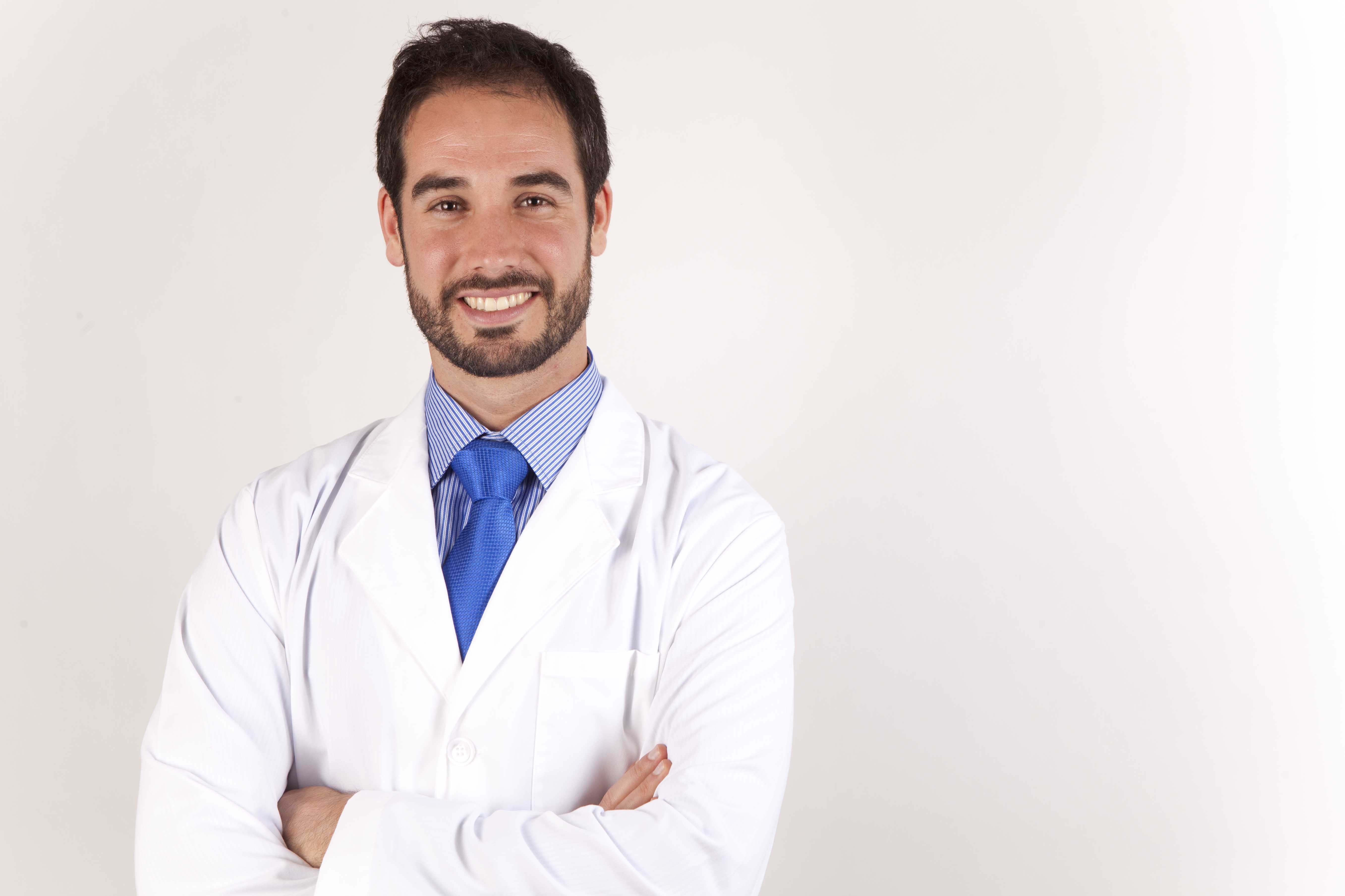 Dr. Sergio Calleja in clinical attire